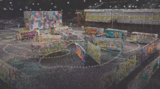 3D point cloud of a graffiti-covered concrete area with ramps and walls against a dark background.