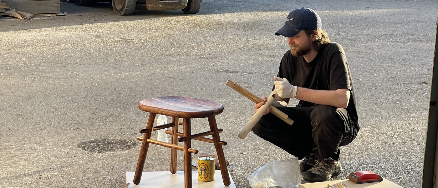 Wooden stool, student outside