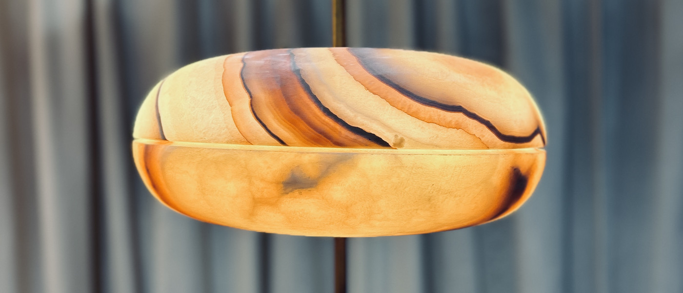 Golden lamp on blue background