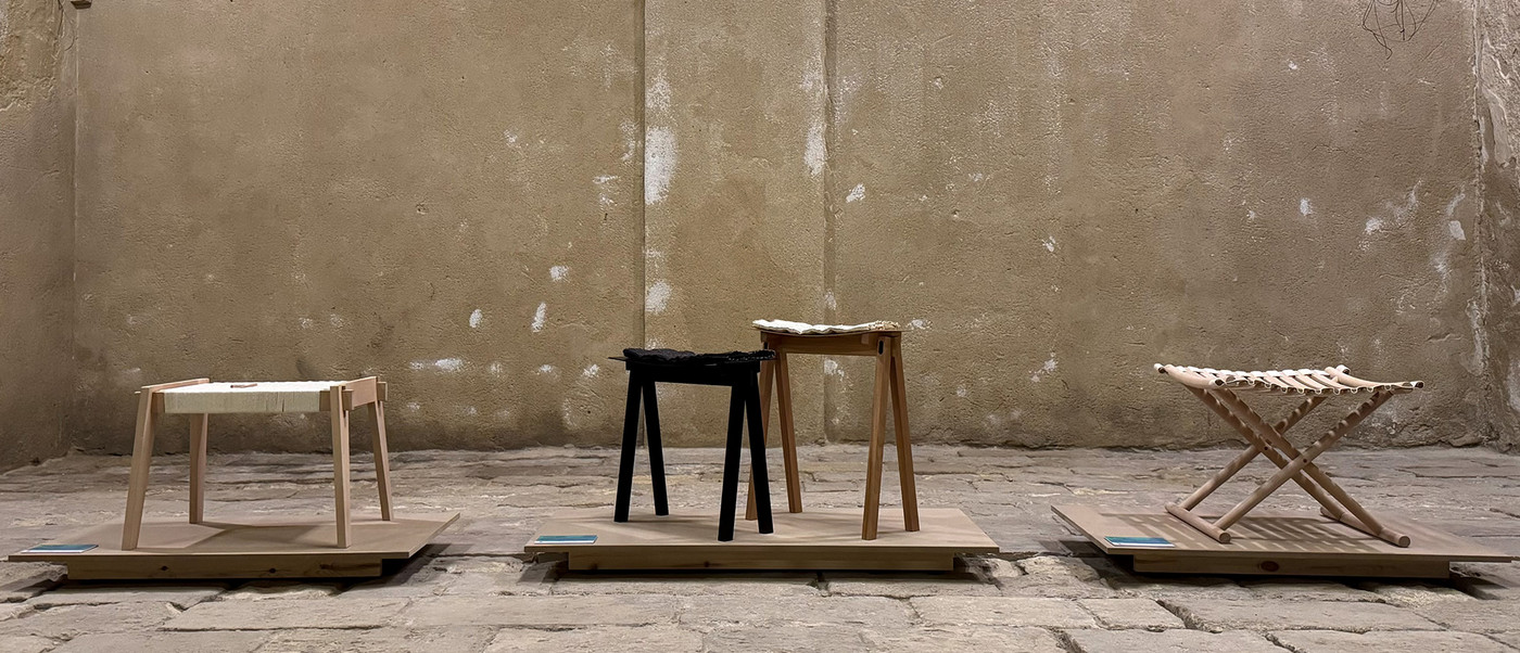 Four wooden stools