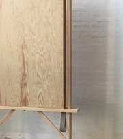 Wooden frame with mounted plywood board