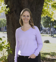 Image of woman in front of chestnut tree