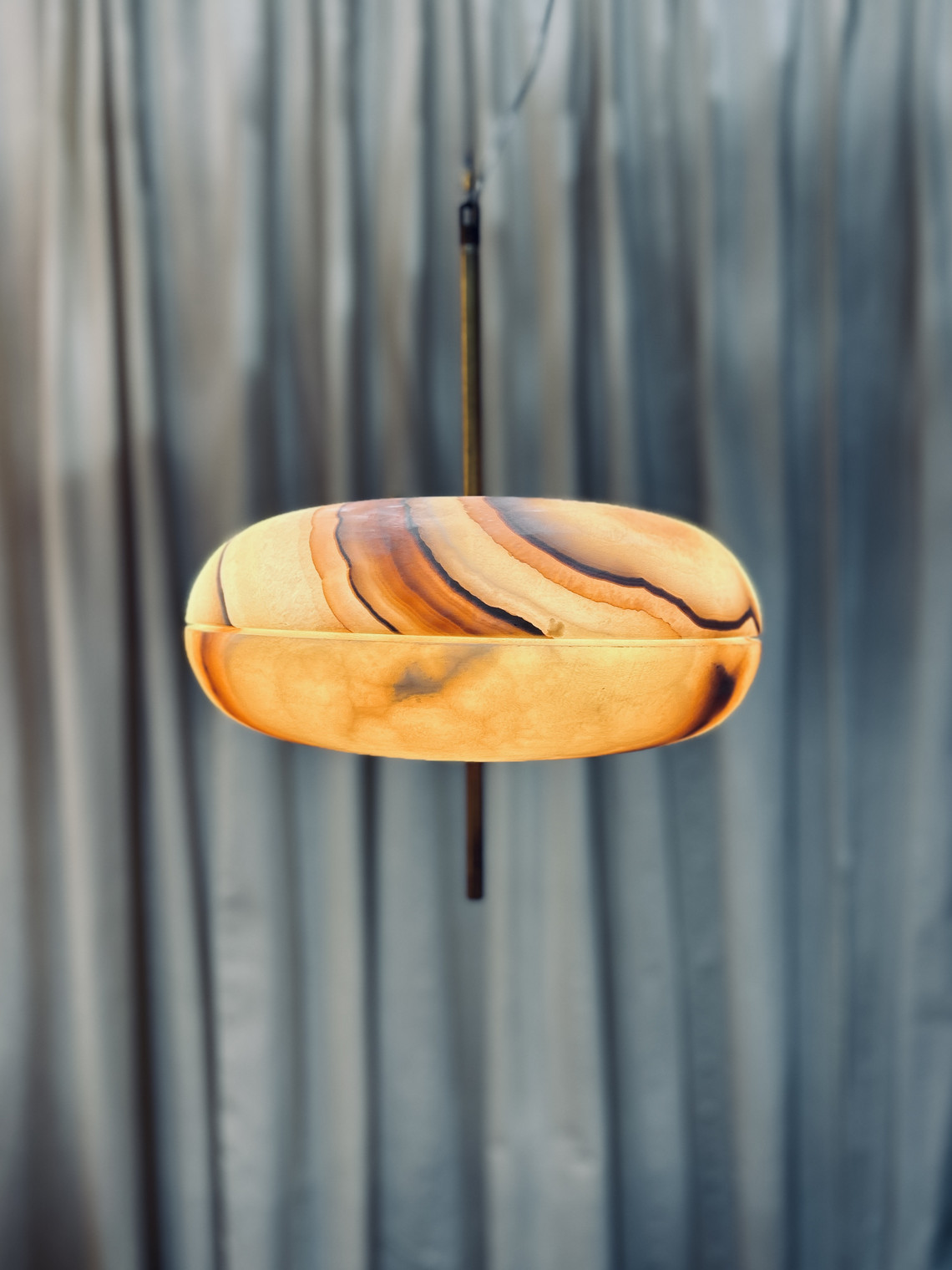 Golden lamp on blue background