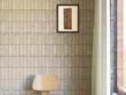 Tiled room with chair.