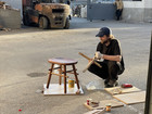 Wooden stool, student outside