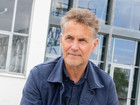 Nicolai de Gier in front of window