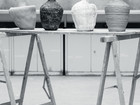 our ceramic vases on a table in a workshop.