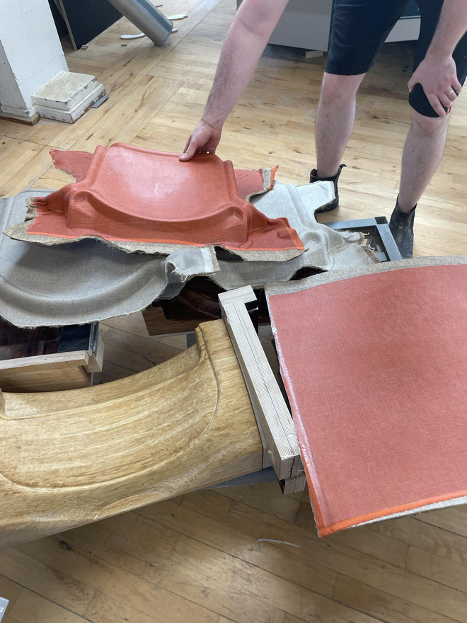 Pressed parts ready to be cut to final shape