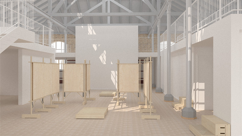 Exhibition space with wooden stands and natural light