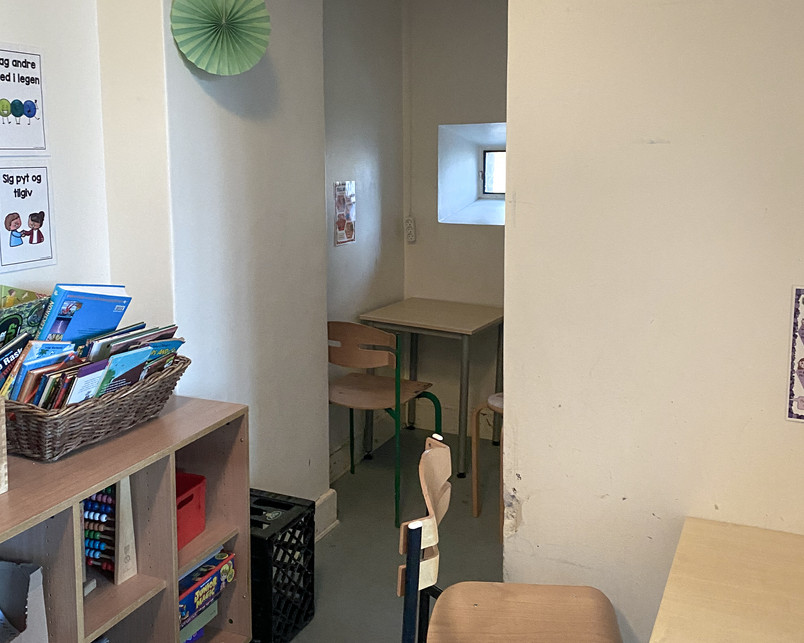 Neglected corner of a classroom with a small table