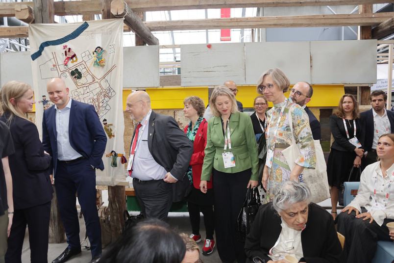 Group of people speaking together 