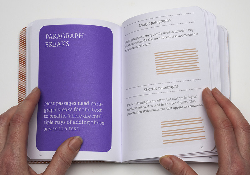 Hands on open book with text