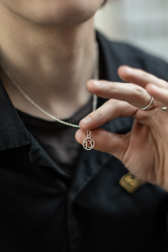 Nathan's necklace : The number 13 all the time.