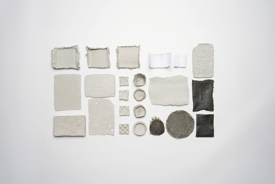 Paper sludge experiments with different materials and moulds