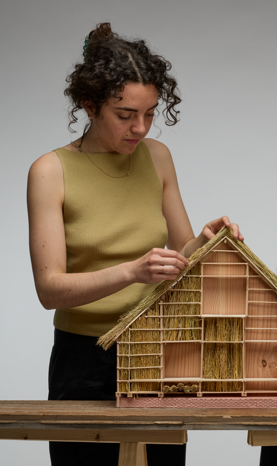 Camille Maingret working on a 1/20 model