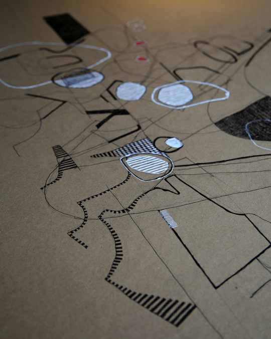 Drawing in black and white on brown paper