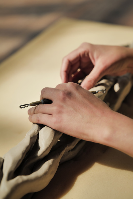 Hands on clay