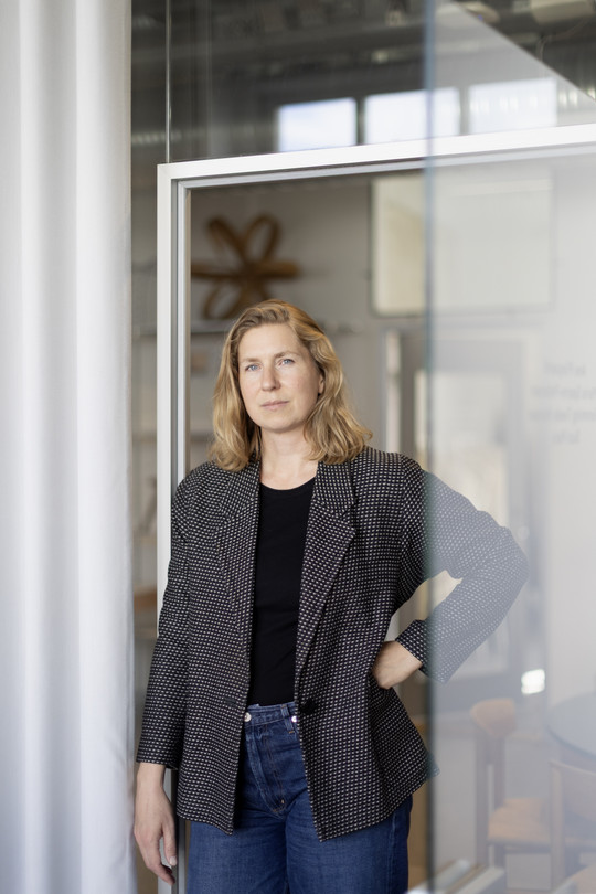 Ane Pilegaard standing in doorway.