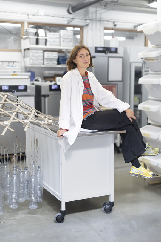 Image of Shayla, sitting in the laboratory 