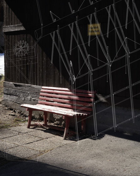 a red bench and drawing of the water structure