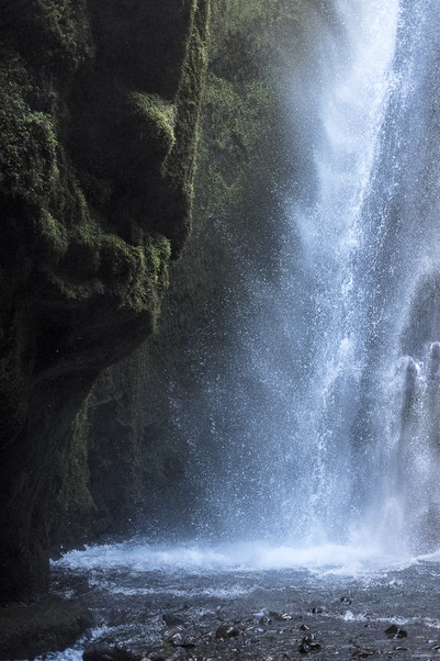 Photograph of a waterfall in a gorge in Iceland